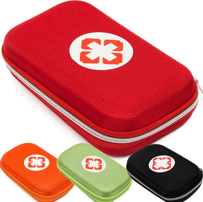 Red plastic survival medical kit emergency storage box with 18 first aid pieces including scissors and bandages