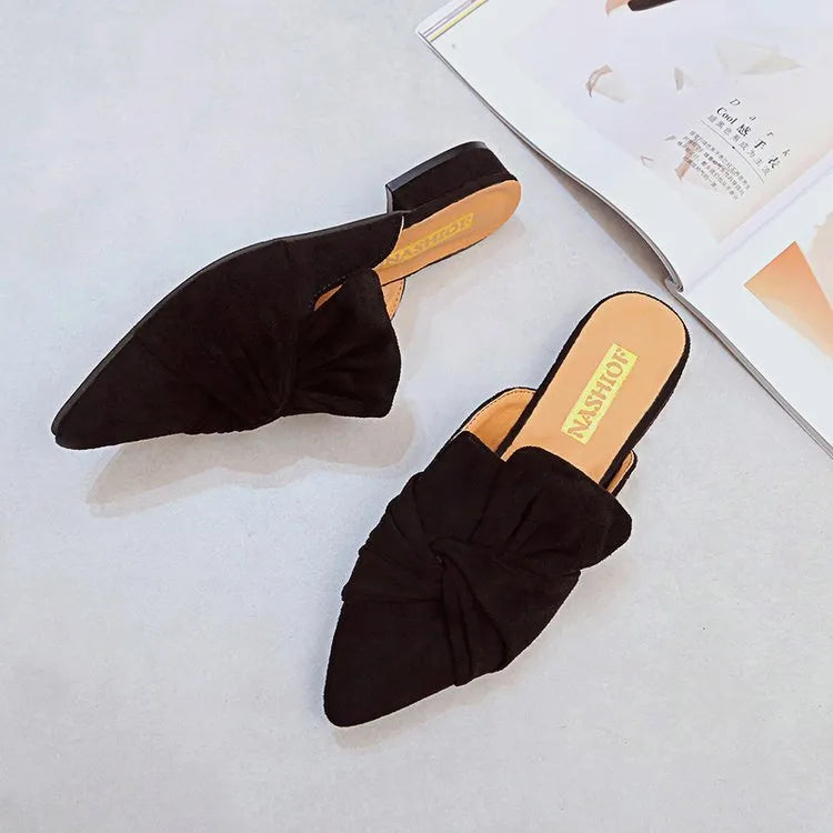 Suede pointed slippers with bow decoration, low square heel, black and beige colour options
