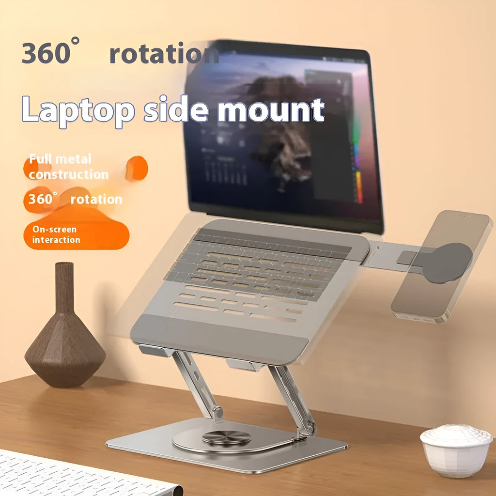 Silver carbon steel laptop stand with a side-mounted, 360-degree rotating magnetic phone holder