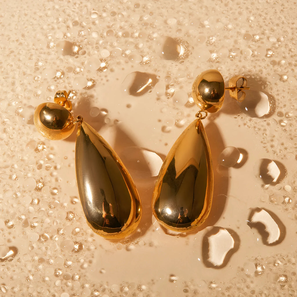 Geometric water drop stainless steel earrings with gold electroplated finish and hemisphere design details