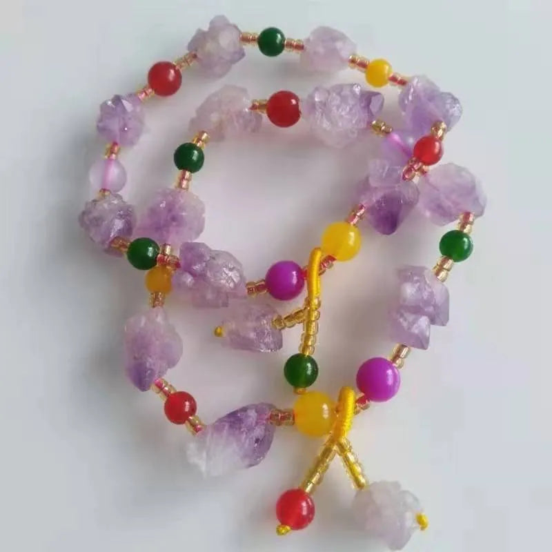 Women's amethyst bead bracelet with fu character charm and natural shaped beads