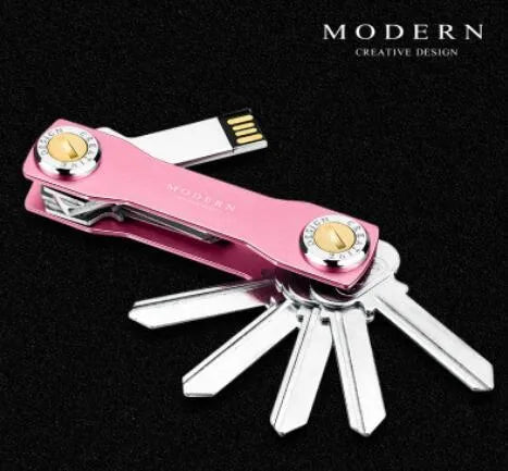 Multi-function metal keychain with stainless steel and anodised aluminium finish, featuring split ring and carabiner, in grey colour option.