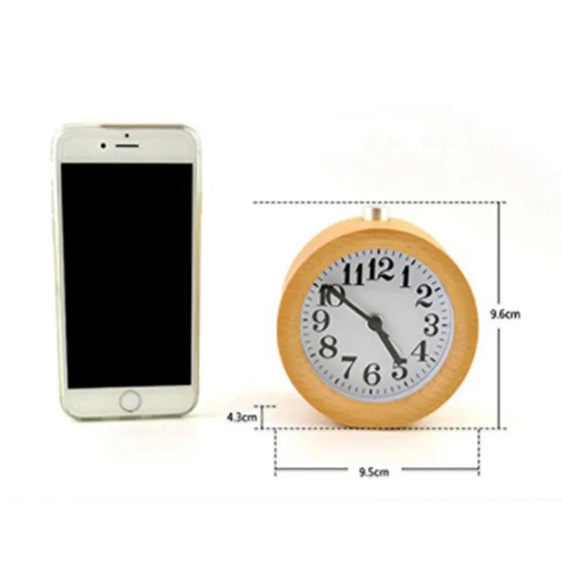 Solid beech wood silent snooze alarm clock with a 4-inch white dial on a wooden base.