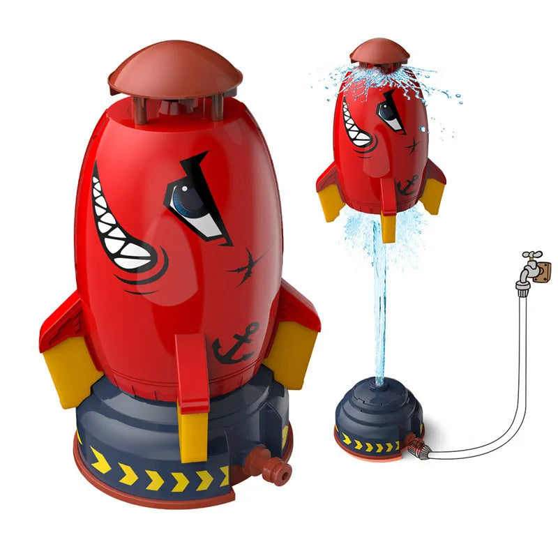 Water pressure rocket launcher toy on green grass with water spray, yellow rocket, and base connector