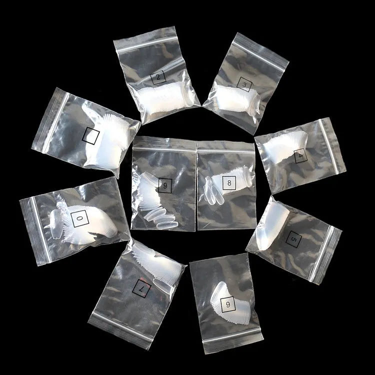 500 clear false nails in various sizes with ABS material for professional nail applications