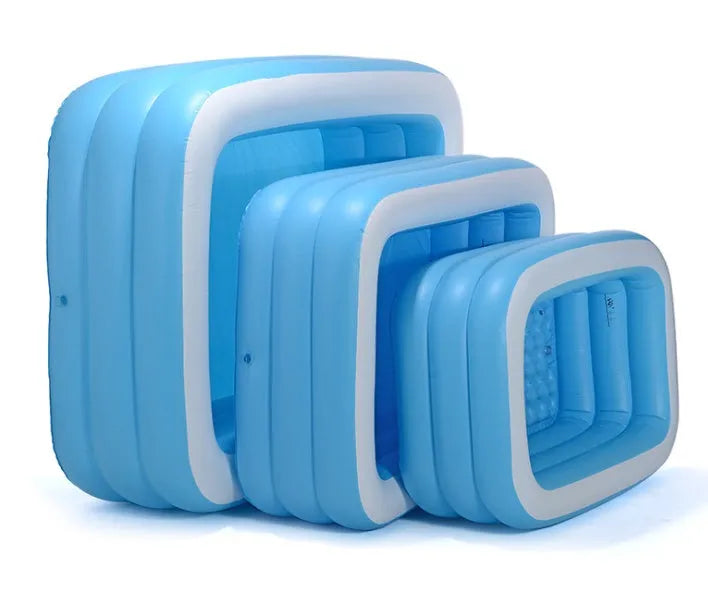 Blue and white rectangular inflatable PVC swimming pool 150cm x 110cm x 50cm in a garden setting
