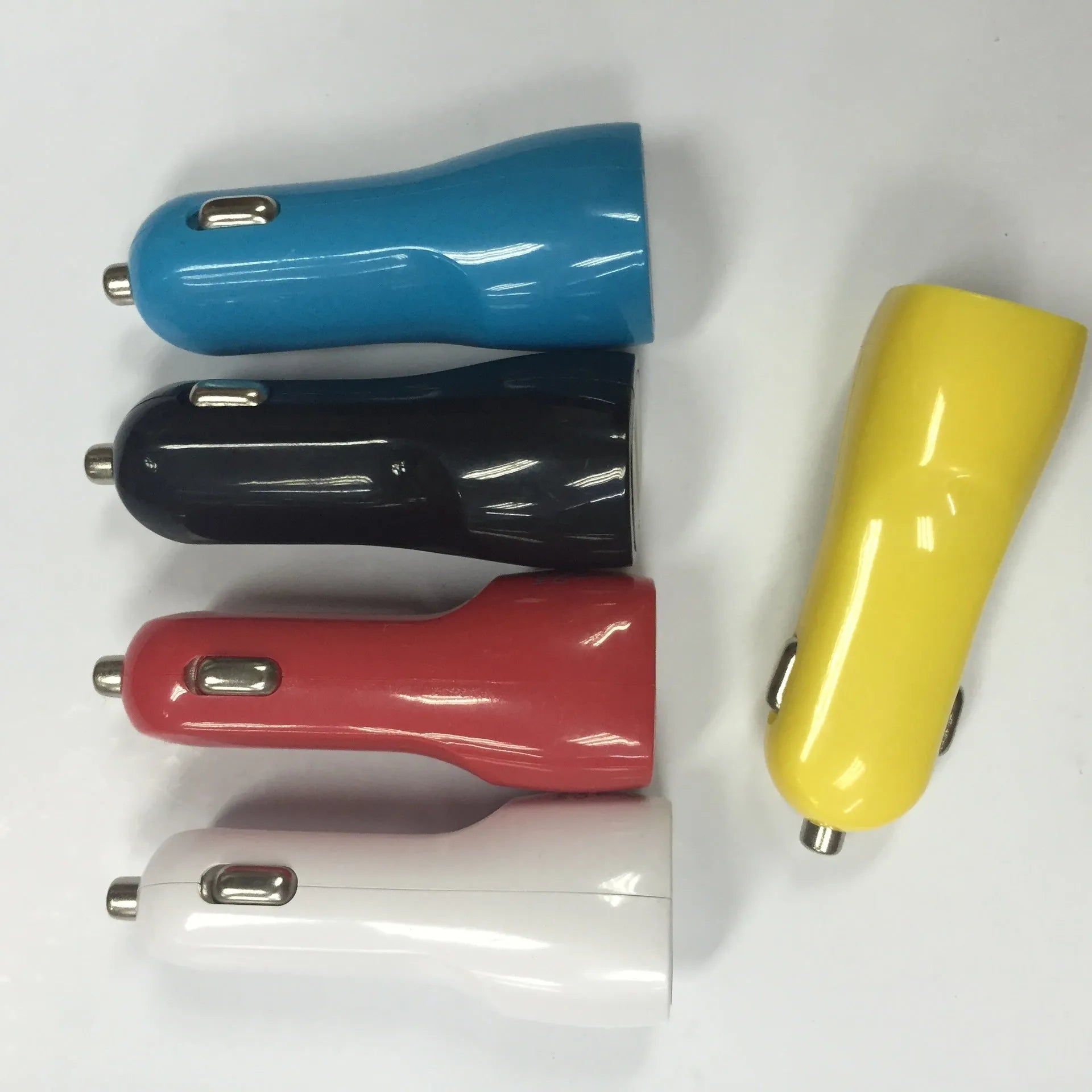 Dual USB port car charger with blue LED light indicator in cigarette lighter socket