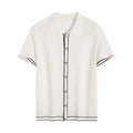 White short sleeve cardigan with dark contrast colour lapels laid flat.