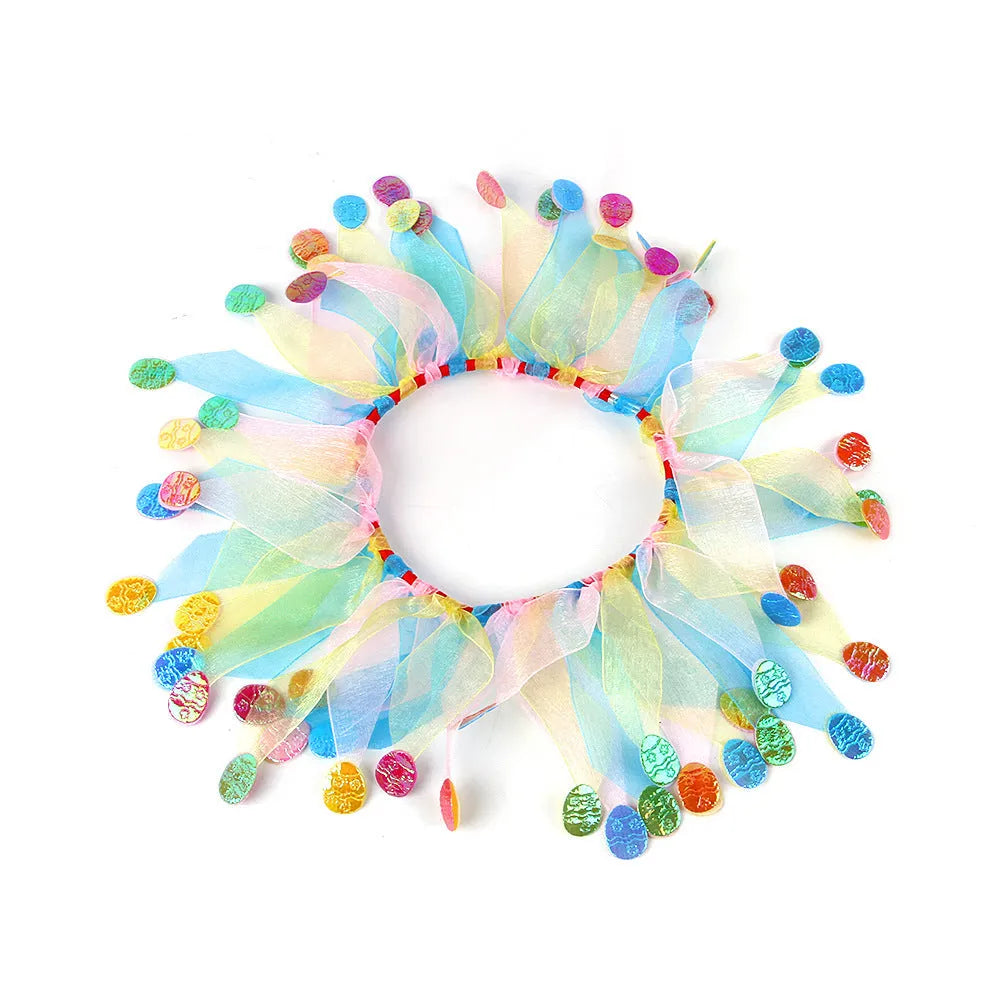 Colourful tie-dye dog collar in green, blue, Halloween, and Christmas styles on a white background.
