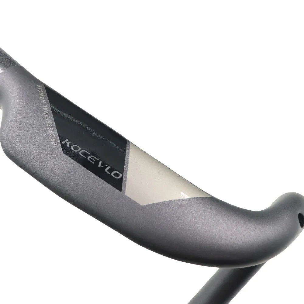 Wei Bike matt black carbon fibre road bicycle handlebar showing bent drop shape