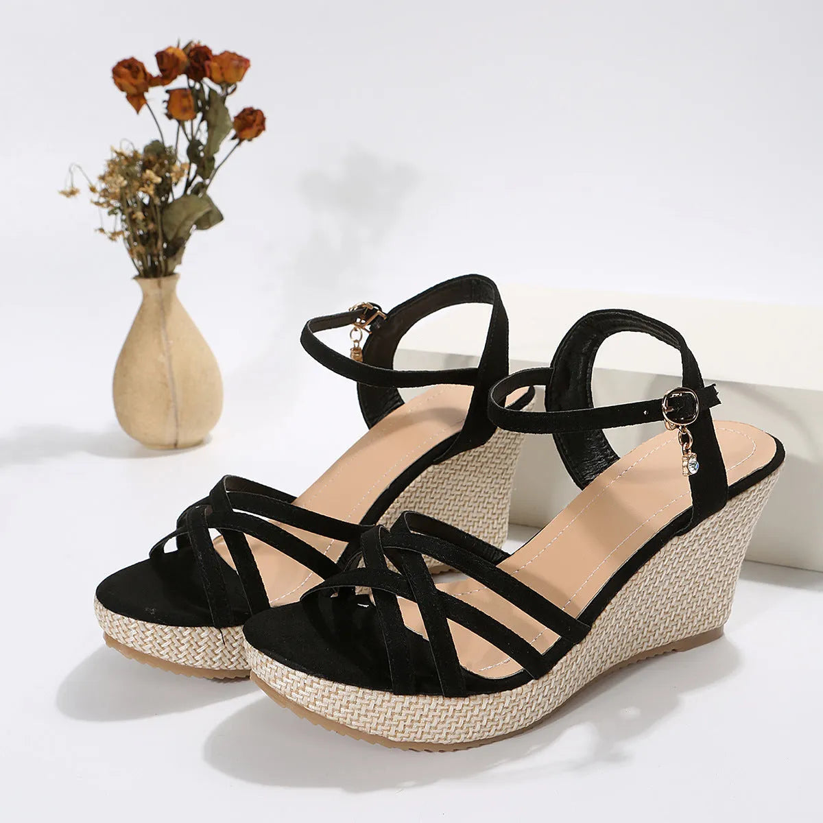 Women's black wedge sandals with fabric uppers and fish mouth toe design