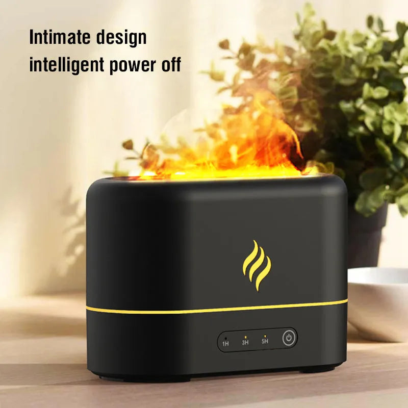 Black aromatherapy humidifier showing seven-colour flame lighting effect and emitting mist from a single outlet.