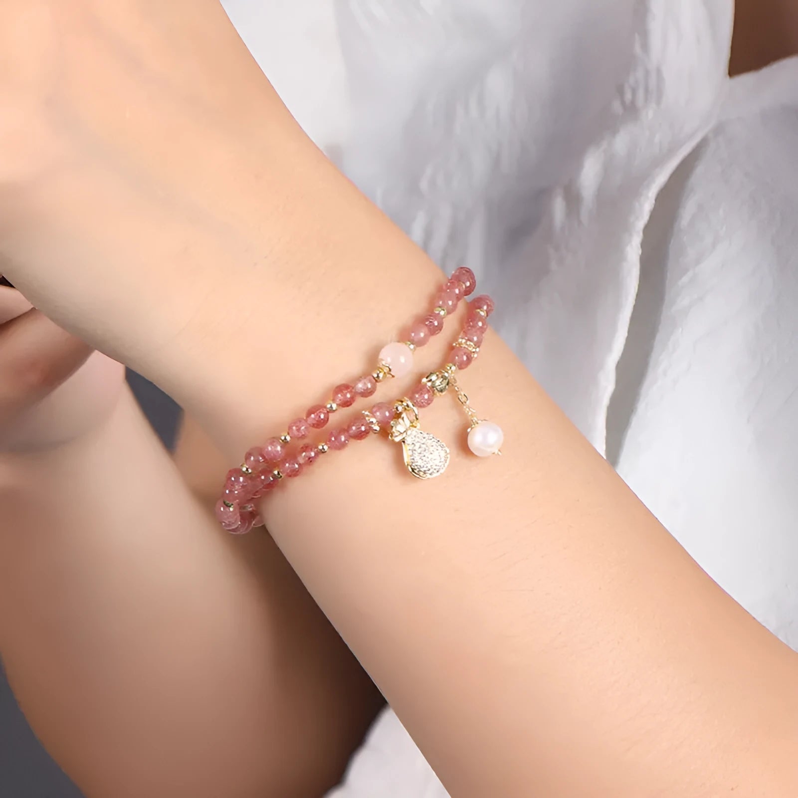 Women's geometric strawberry quartz crystal bracelet with adjustable fitting for money drawing