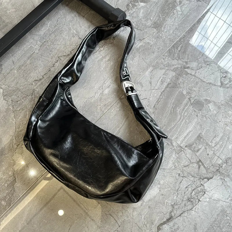 Soft PU large capacity commuter shoulder bag in black, horizontal square shape, with single shoulder strap