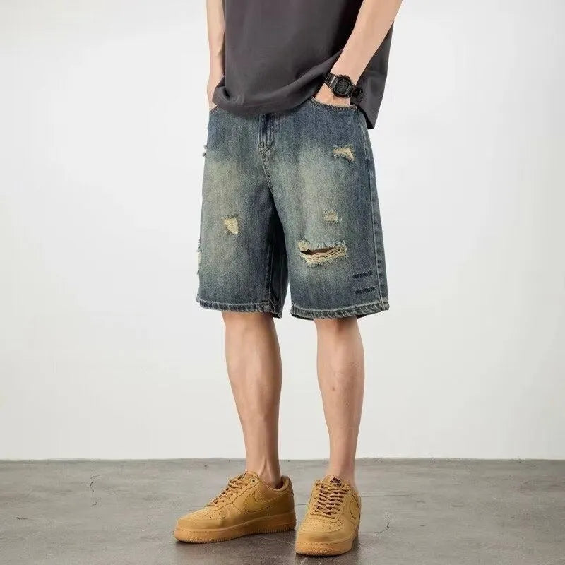 Men's loose fit washed blue denim shorts with straight leg and micro elasticity