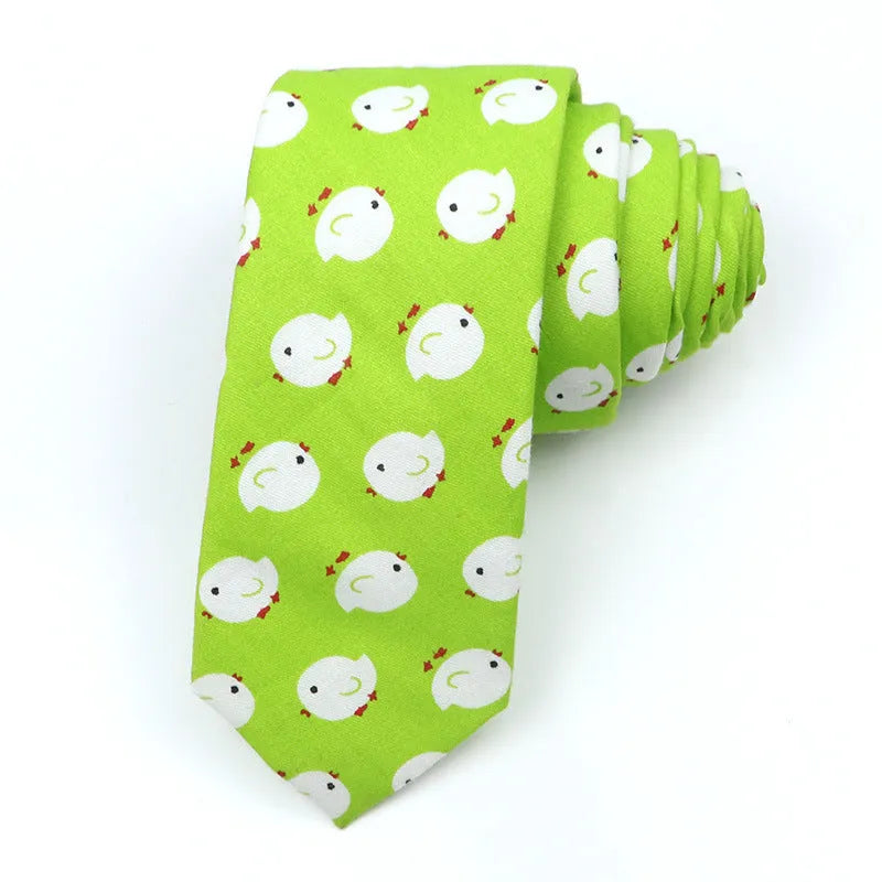 Narrow cotton bow tie with a printed cartoon pattern in a selection of colours.