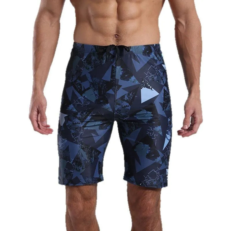 Blue men's knee-length polyester boxer swimming trunks for sports and water activities