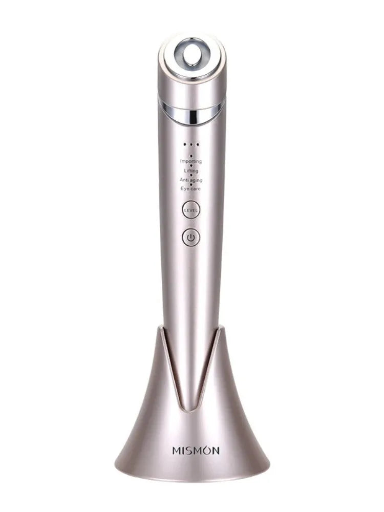 Pulse RF beauty instrument in mist blue held in hand, showing silicone head and control button