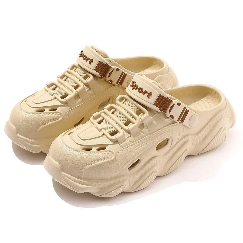 Men's khaki outdoor slippers with hollow-out design and lightweight EVA sole on a wooden deck.