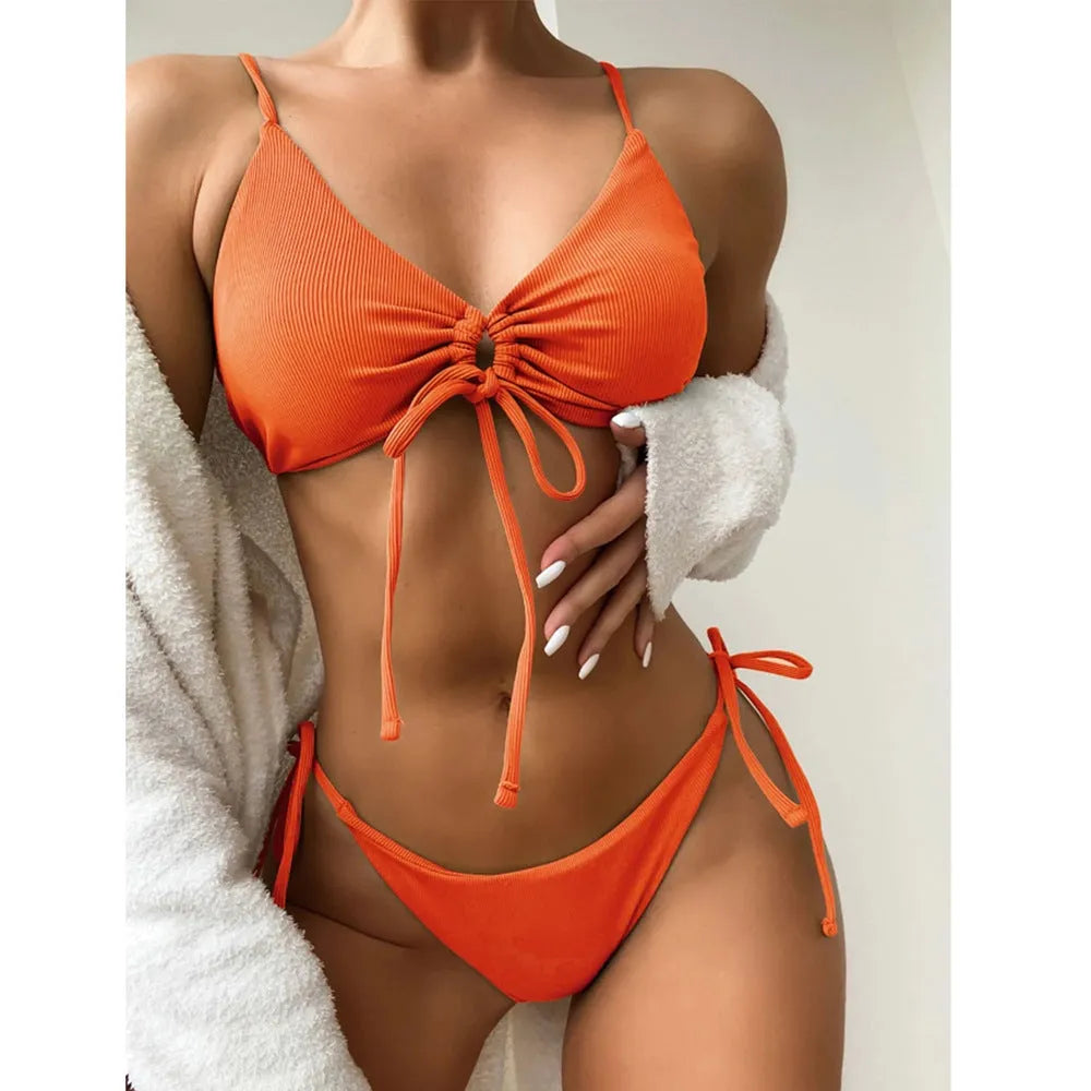 Women's solid colour drawstring bikini set in army green, showing briefs style and backless design for swimming.