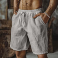 Men's straight-leg cotton linen casual shorts in grey, showing the British style and fit.