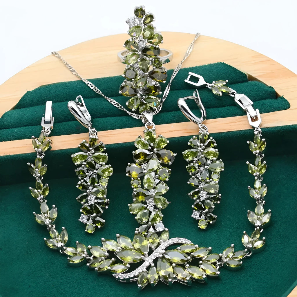 Retro floral pattern jewellery set with necklace, earrings, ring, and bracelet in olive or purple colours