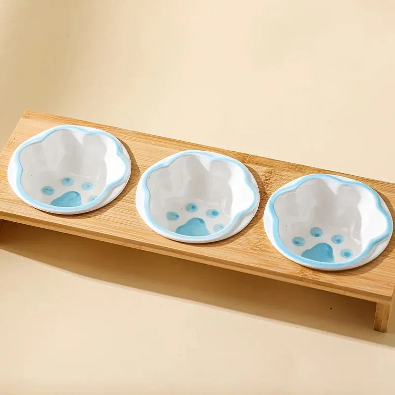 Raised bamboo frame ceramic pet bowl set for small cats and dogs in blue, reducing neck strain during eating