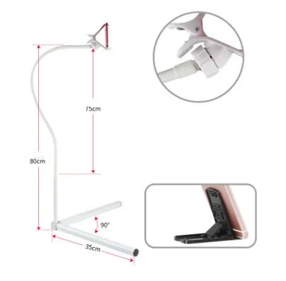 Black mobile phone bed bracket mounted bedside with adjustable overhead support shelf holding smartphone