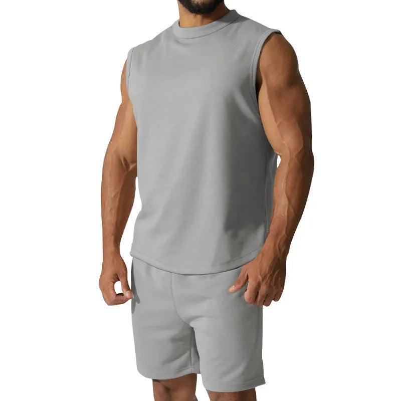 Men's sleeveless cotton blend sports top and matching shorts casual set in army green.