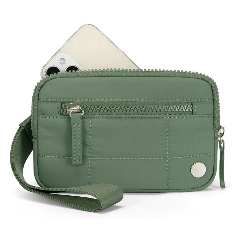 Waterproof quilted handbag with transparent deck section in nylon material