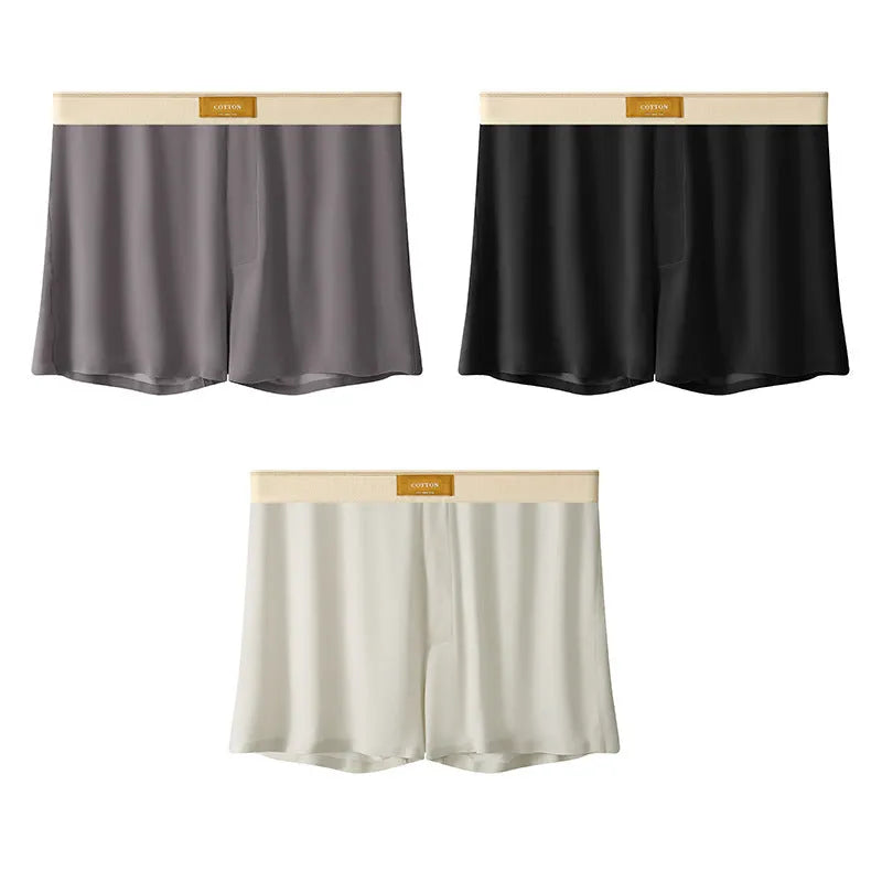 Men's solid colour loose Ice Silk underwear briefs on a neutral background