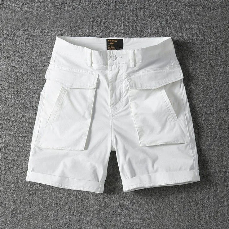 Men's stretch cotton cargo shorts in khaki with multiple pockets and straight-leg fit.