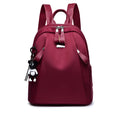 Medium black Oxford cloth fashion rucksack with internal phone and ID pockets