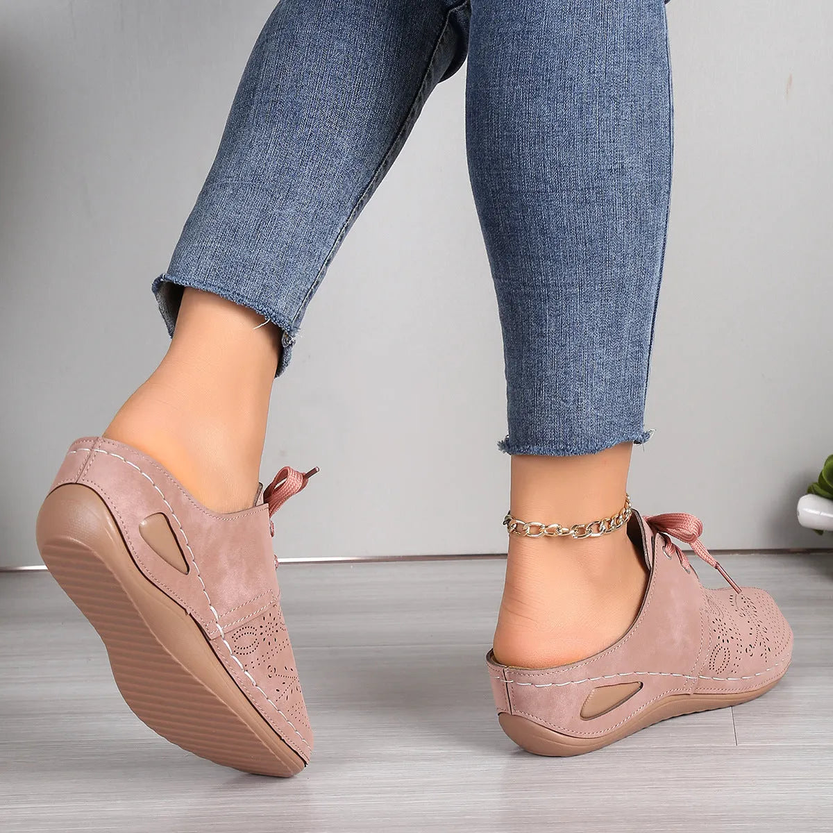 Women's lace-up Baotou slippers with hollow-out wedge design in suede material, available in multiple colours.