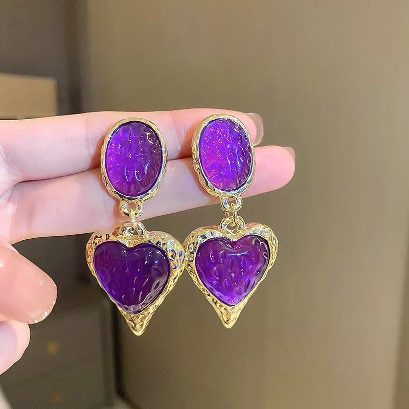 Alloy oval love heart stud earrings with pleated detail in four colour options