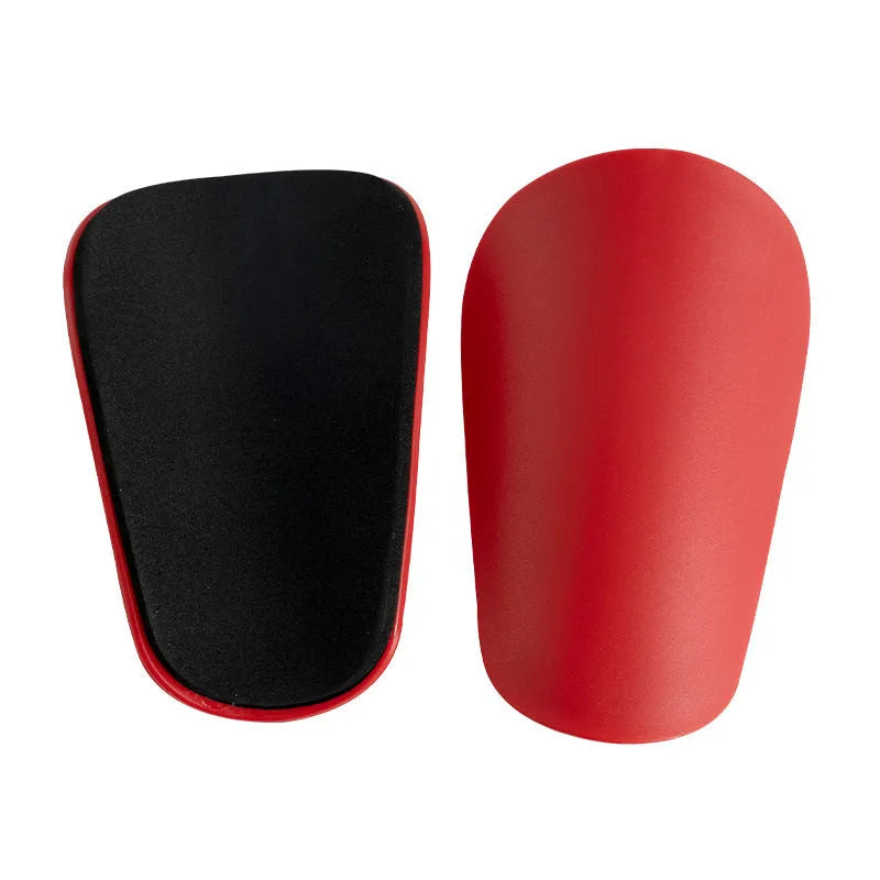 PU mini shin guards in black, white, red, and dream blue colours with S and XS sizing codes