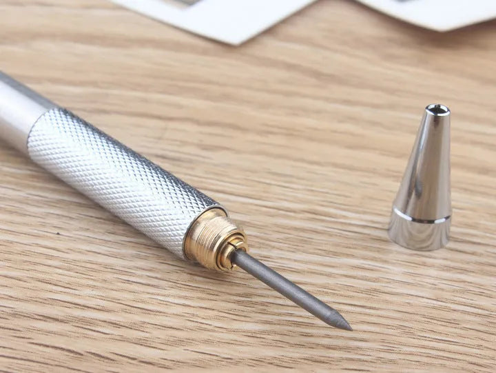 Metal automatic mechanical pencil compatible with five sizes of 2B lead refills.