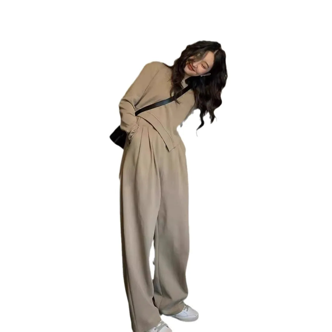 Women's khaki coloured loose-fitting sports suit with long sleeve top and full length trousers