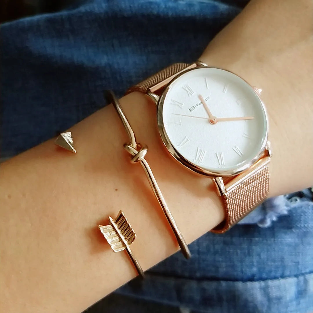 Gold electroplated alloy vintage cuff bracelet with arrow and knot design for women