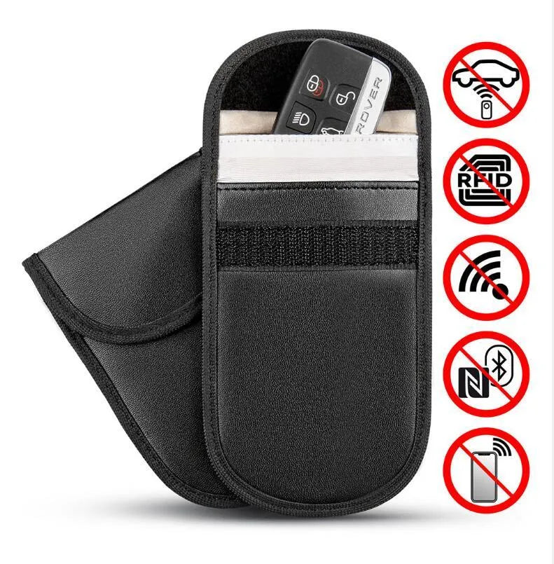 Black microfiber Faraday cage car key signal blocker case measuring 13.5 by 9.5 centimetres.