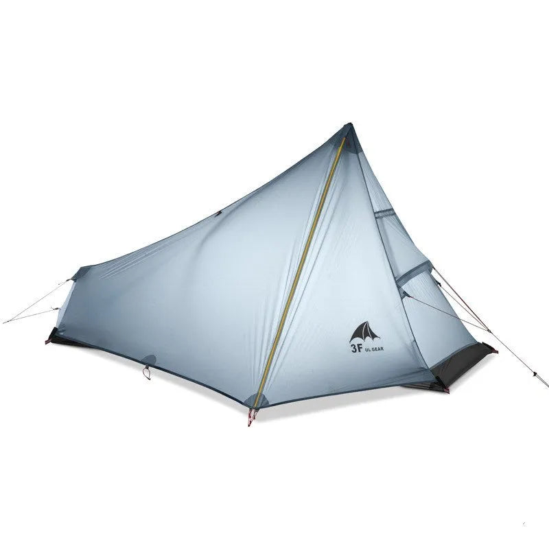 Green silicon coated outdoor camping pyramid tent pitched on grass with aluminium pole and reflective wind ropes