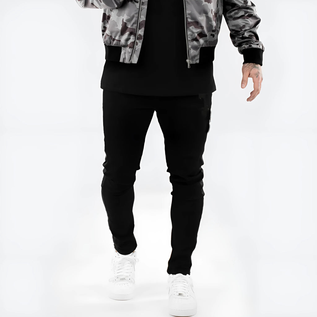 Men's ripped black slim-fit high waist cotton denim trousers with elastic waist