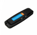 Black and white creative USB flash drive with voice card function on a plain background