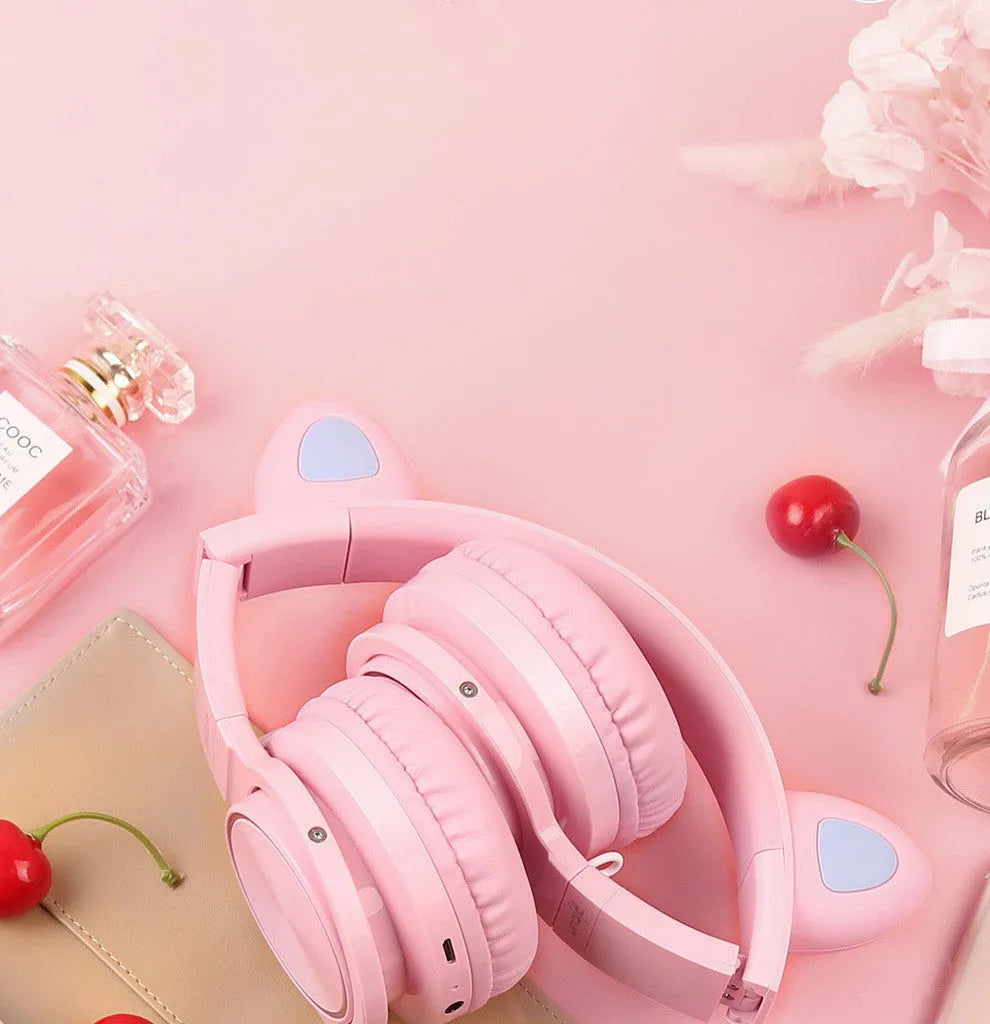 Pink white Bluetooth wireless headset with head-mounted design and 40mm speakers
