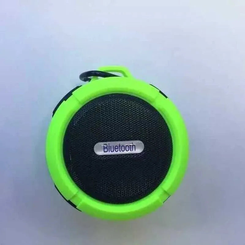 Portable waterproof Bluetooth speaker in multiple colours with bag clip for outdoor use