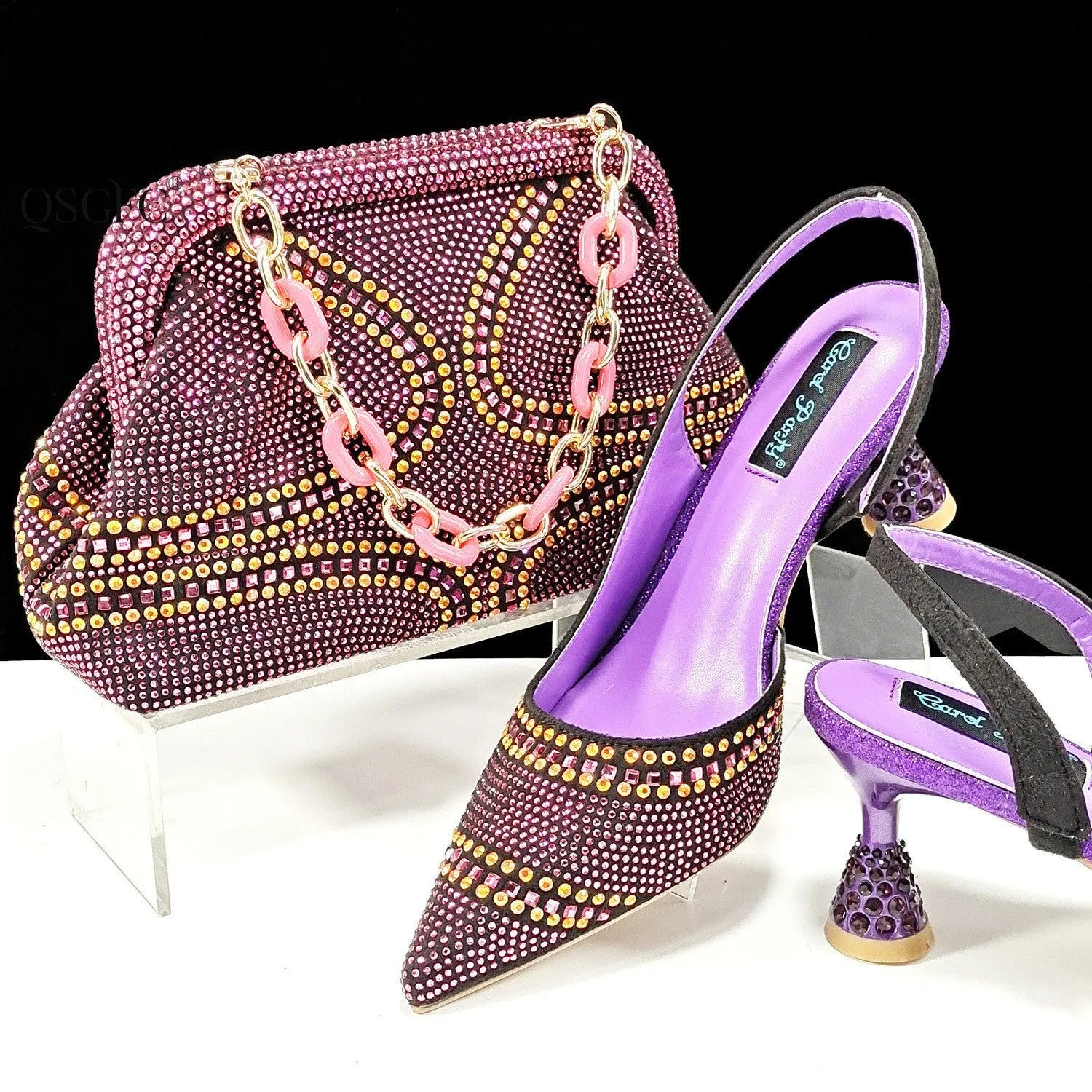 Women's pointed toe high heels with rhinestones and a matching small bag, shown in one of eight available colours.