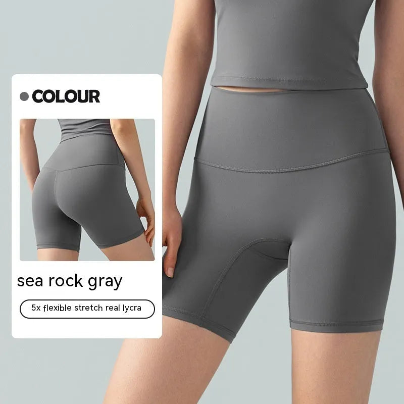 Women's lycra yoga tight shorts in leaf green colour showing high waist and short length design