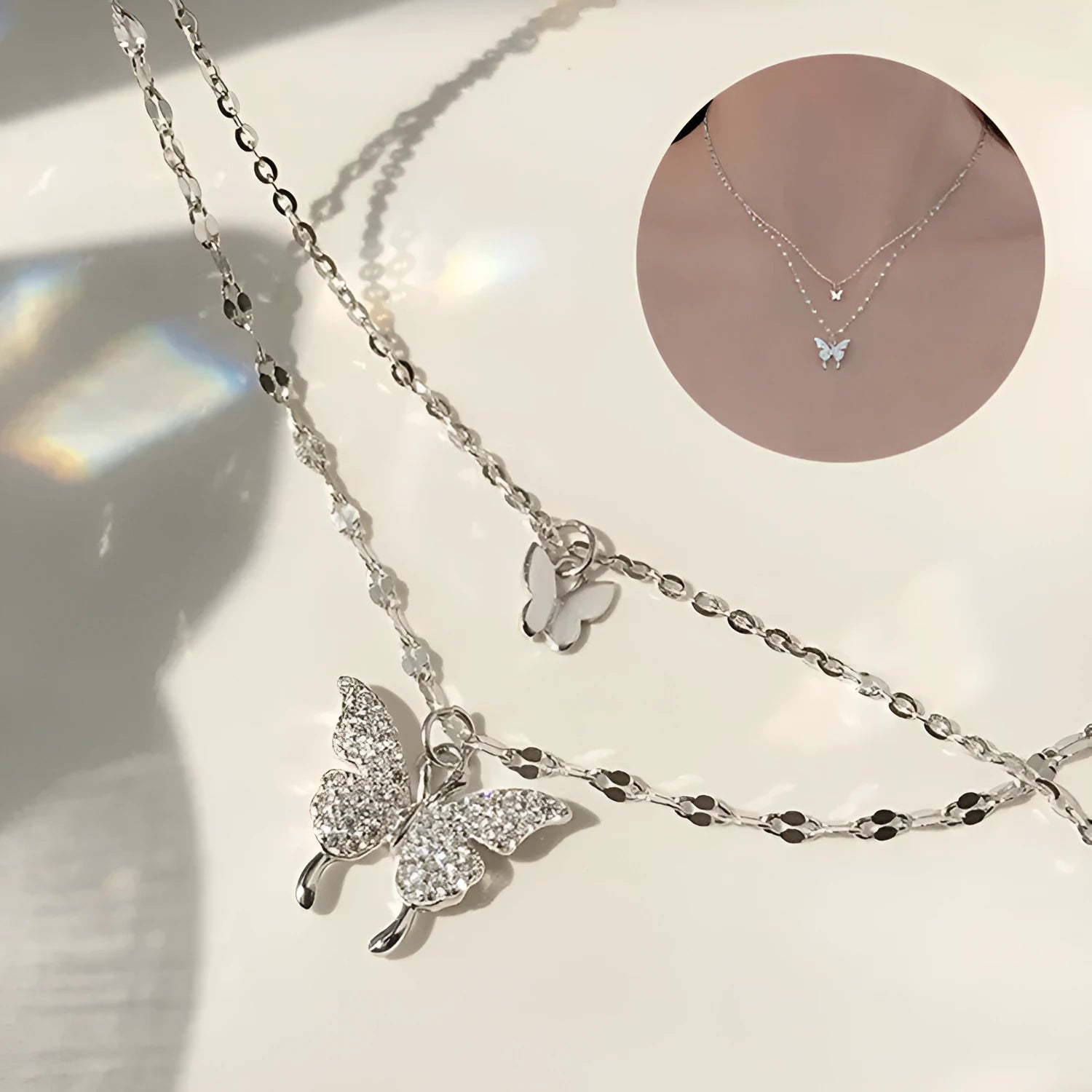 Silver colour double layer clavicle chain necklace with shiny butterfly pendant on copper base