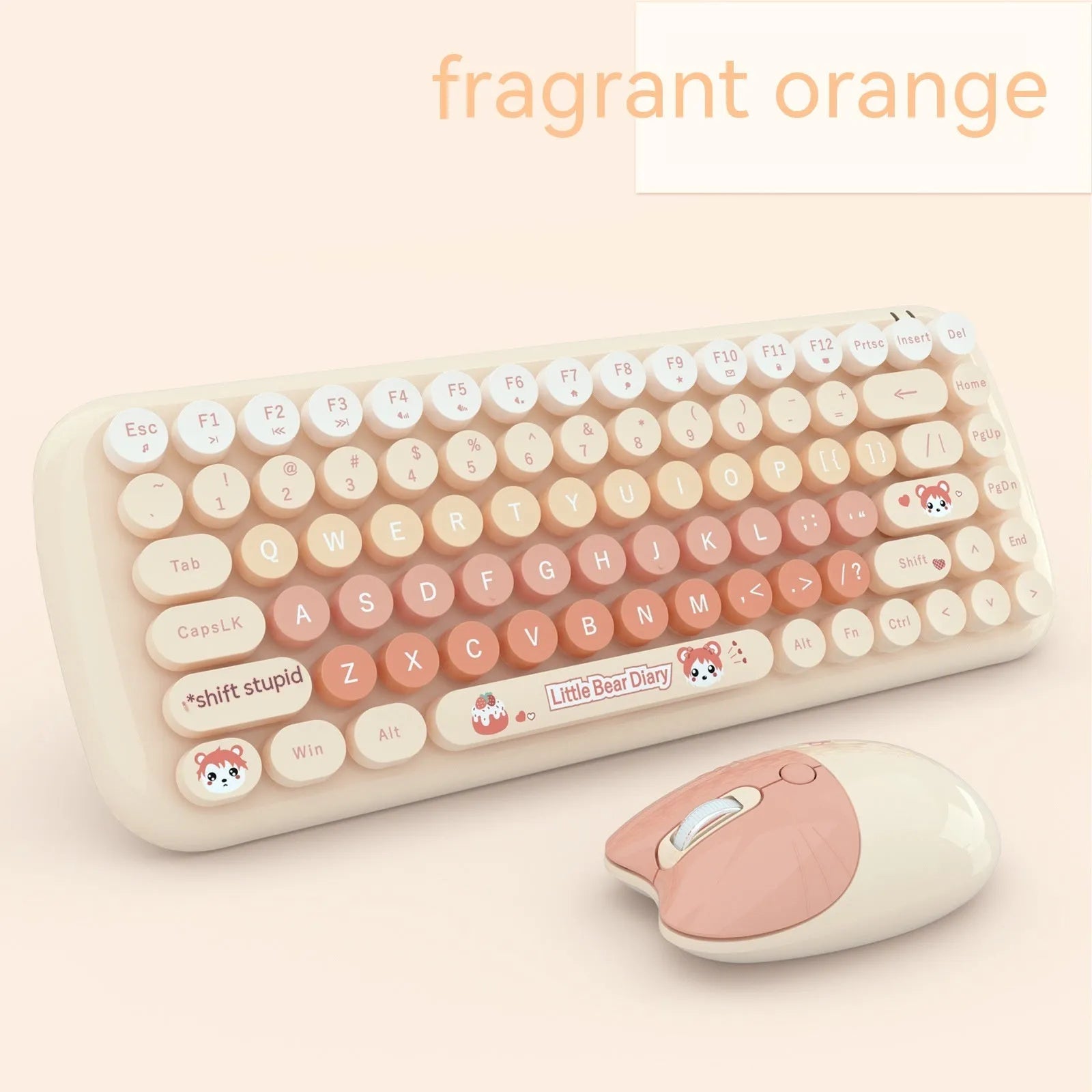 Pink mini cartoon-style wireless keyboard and mouse set on a desk with receiver.