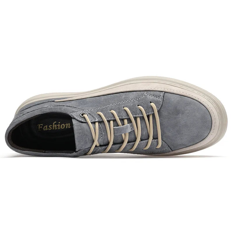 Men's grey casual leather skate shoes with round toe, low top design and rubber soles